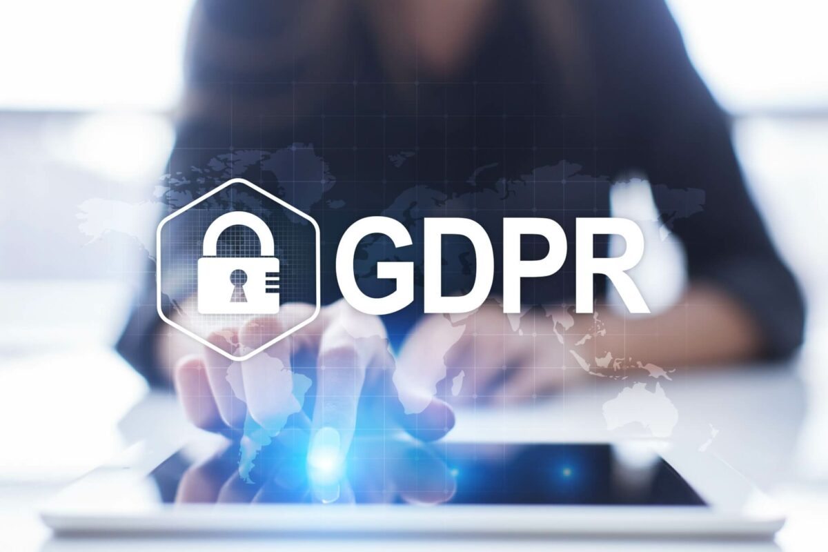GDPR logo with woman in the background on tablet